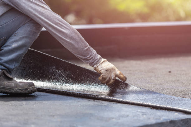 Professional Basement Waterproofing technician working in Laceys Spring, AL